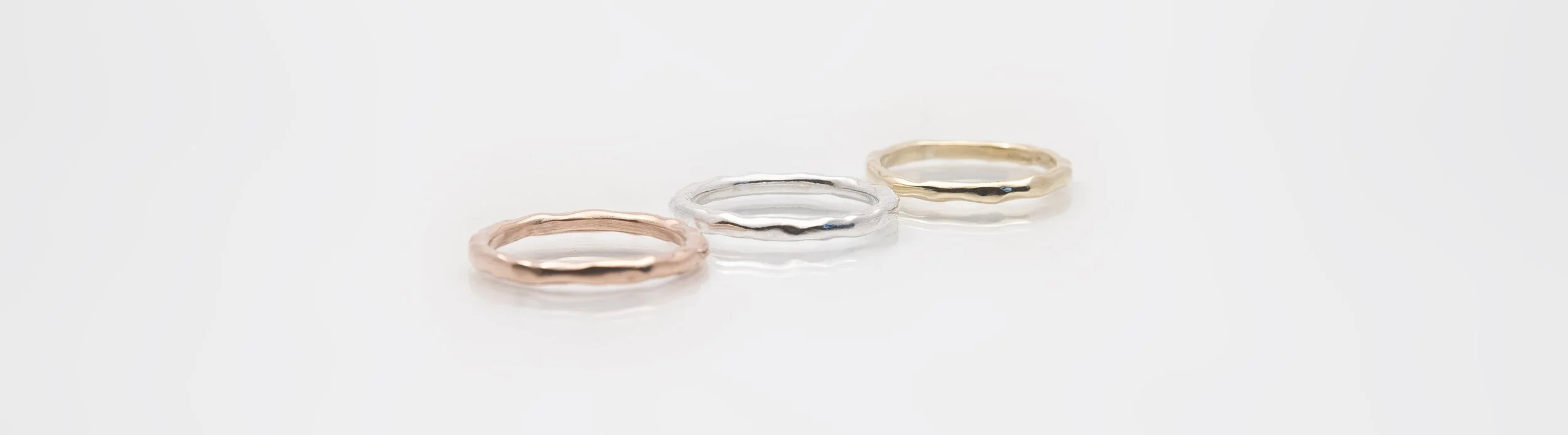 martina hamiton handcrafted gold band rings.jpg