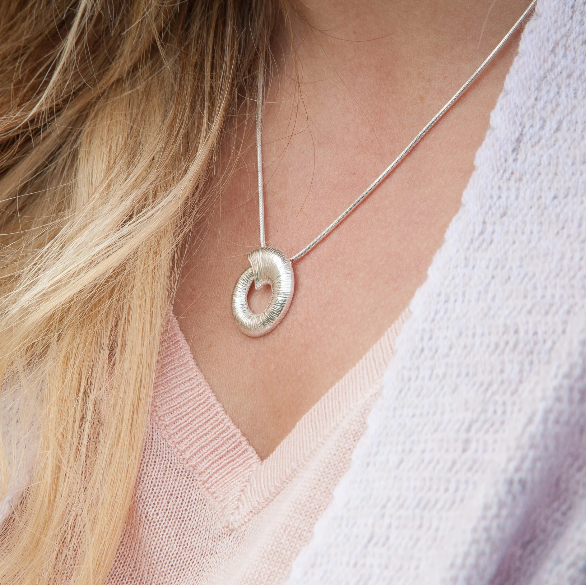 Croi Sliogan Silver Pendant Model Shot.jpg