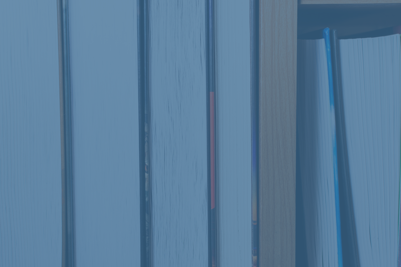Books with blue overlay.png