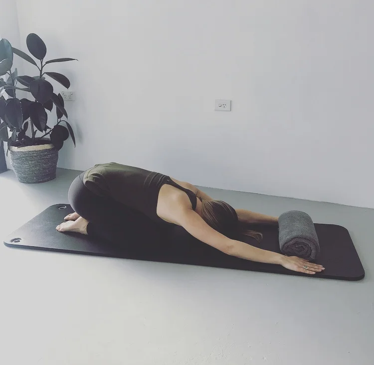 back pain while breastfeeding