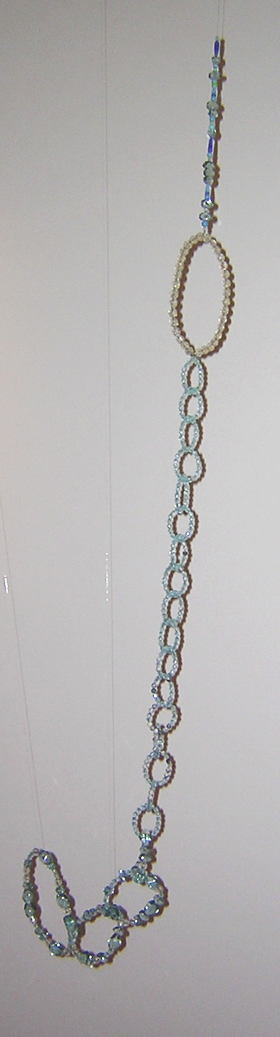 Toads and Lizards Installation, Oresman Gallery, Smith College Museum of Art 72 x 24 x 12 inches wire, glass, and crystal beads 2004