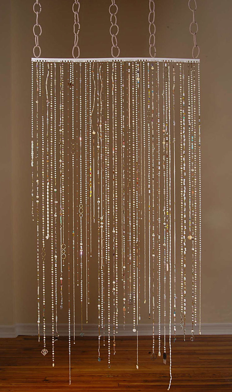Crazy Quilt 75 x 40 x 1 inches materials include; glass and plastic beads, chains, wire, notions, found objects