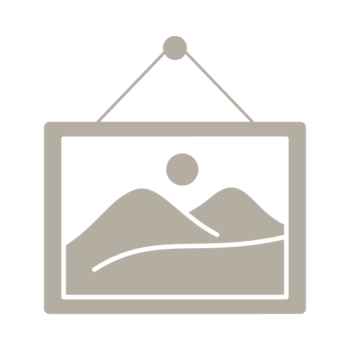 A framed landscape photograph hanging on a wall