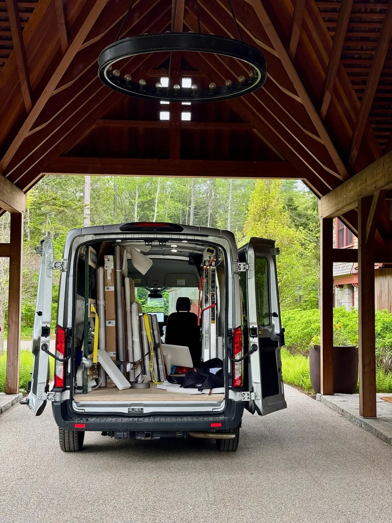 Art handling van loaded with framed artwork and installation materials for a Powell Fine Art Advisory project.