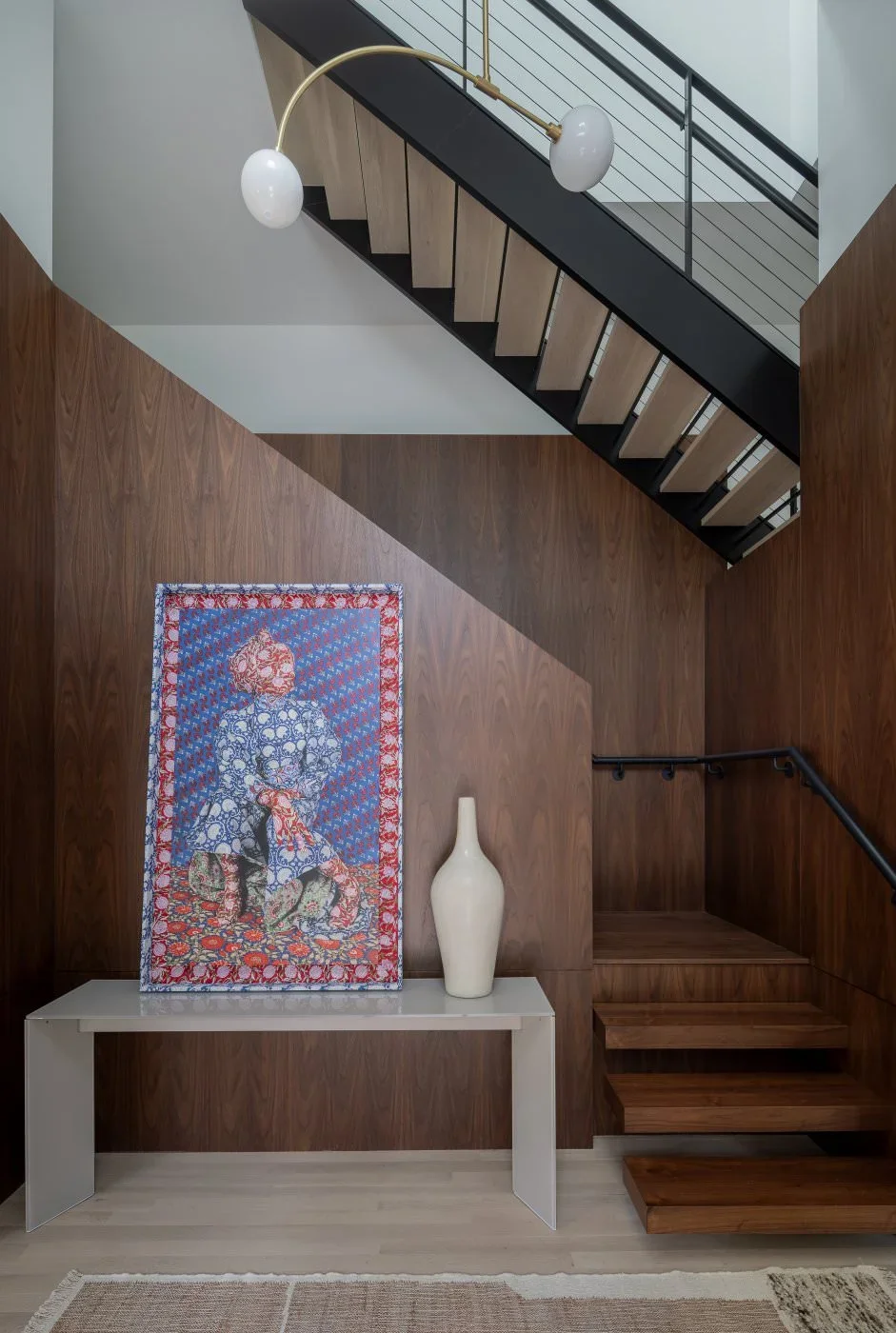 Artwork installed within architectural wood paneling