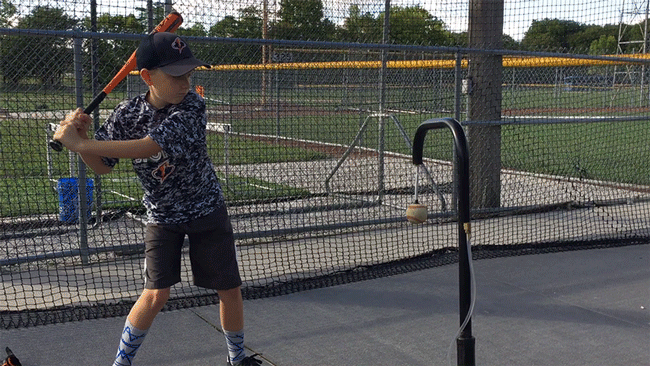 Rapidly learning proper swing form on one of our later prototypes.
