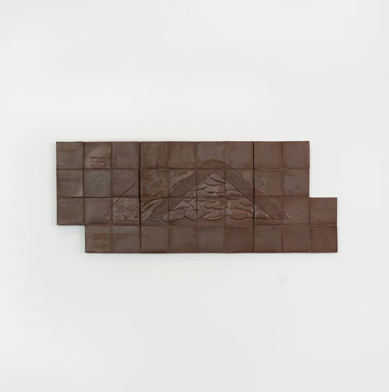 Harvesting Methods (Yam Heap) 2018 Glazed stoneware, grout 26”H x 79”W x 1”D Photograph courtesy of MCA Denver