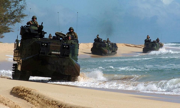 These aged amphibious assault vehicles are not hard for enemies to track and target. The Marine Corps must step up its investment in new technology if it is going to win wars against enemies equipped with the latest information technologies. (U.S. Navy photo by Journalist 2nd Class Zack Baddorf/RELEASED)