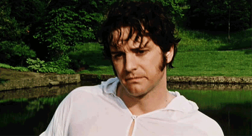A gif of Colin Firth as Mr. Darcy, standing wet near a pond. He maks a worried face.