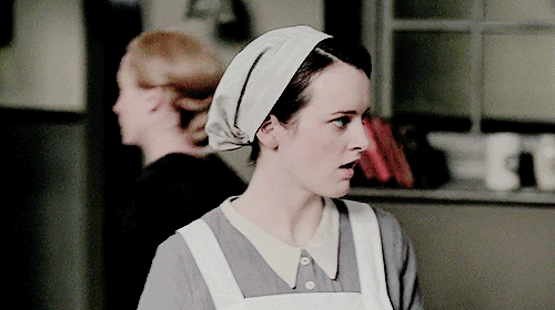 An animated gif: a maid in Downton Abbey makes a shocked and excited look.