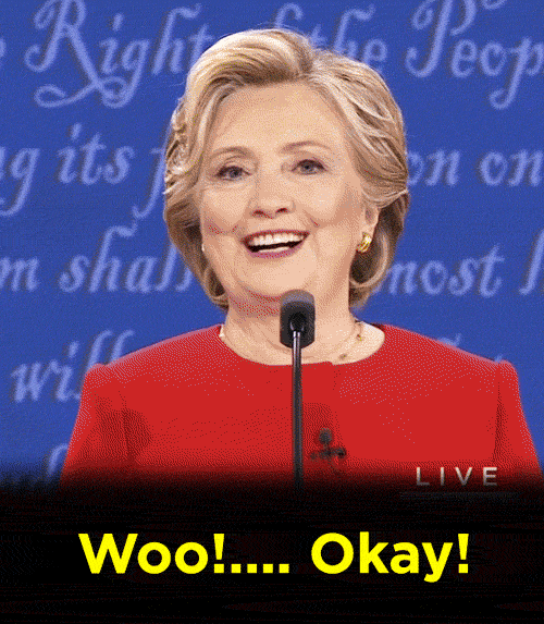 An animated gif of Hillary Clinton smiling and saying “Woo! Okay!”