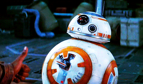 An animated gif in which BB8 replies to Finn’s thumbs-up by sticking out a protruberance with a lighter on it and lighting it.