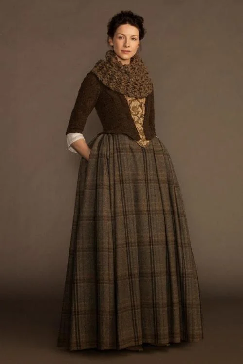 Claire, from Outlander , wearing a very chunky brown cowl.