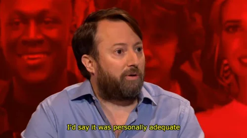 Images from a game show. The show host asks, “How was your 2017, David?” The contestant replies, “I’d say it was personally adequate and internationally disastrous.”