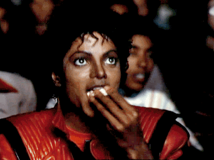 An animated gif of Michael Jackson eating popcorn, from the “Thriller” video.