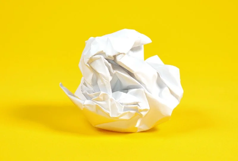 A balled-up sheet of white paper.