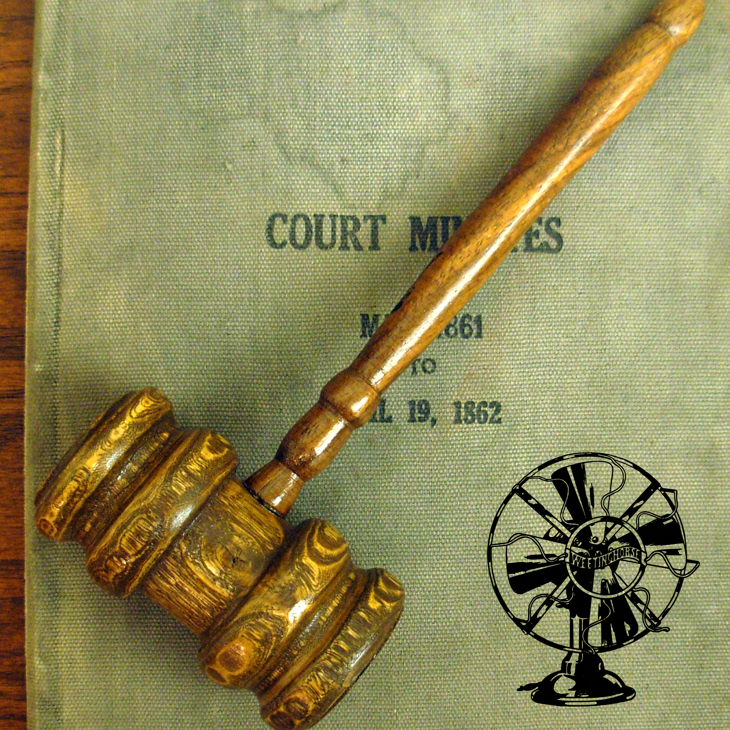 Episode 4’s cover: a gavel rests across a law book.