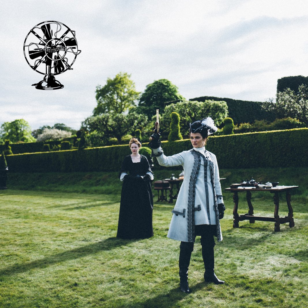 Special Episode 10’s cover: Rachel Weisz, as Sarah Churchill, shoots a gun, while Emma Stone looks on.