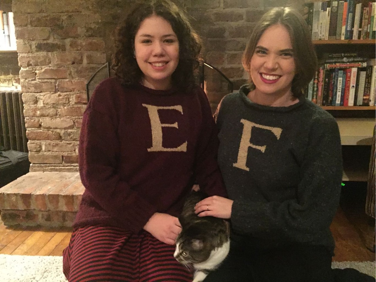 Flourish and Elizabeth wearing matching Harry Potter sweaters.