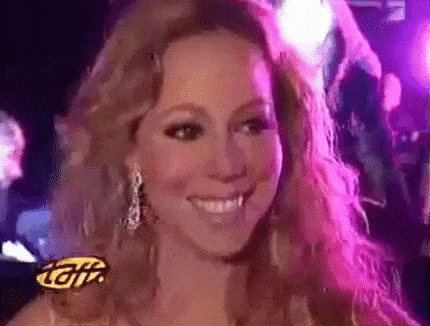A gif of Mariah Carey saying “I don’t know her”