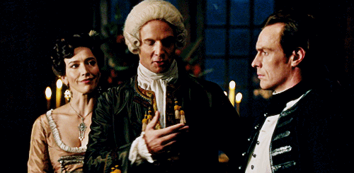 Animated gif of Miranda Hamilton smiling as Thomas Hamilton gestures at James McGraw.