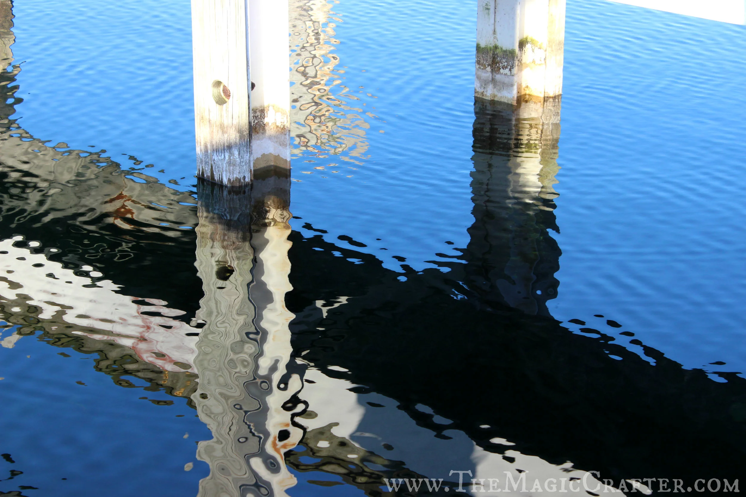 The docks take on new beauty when viewed through the world of reflections. As it turns out, the lake is quite the artist!
