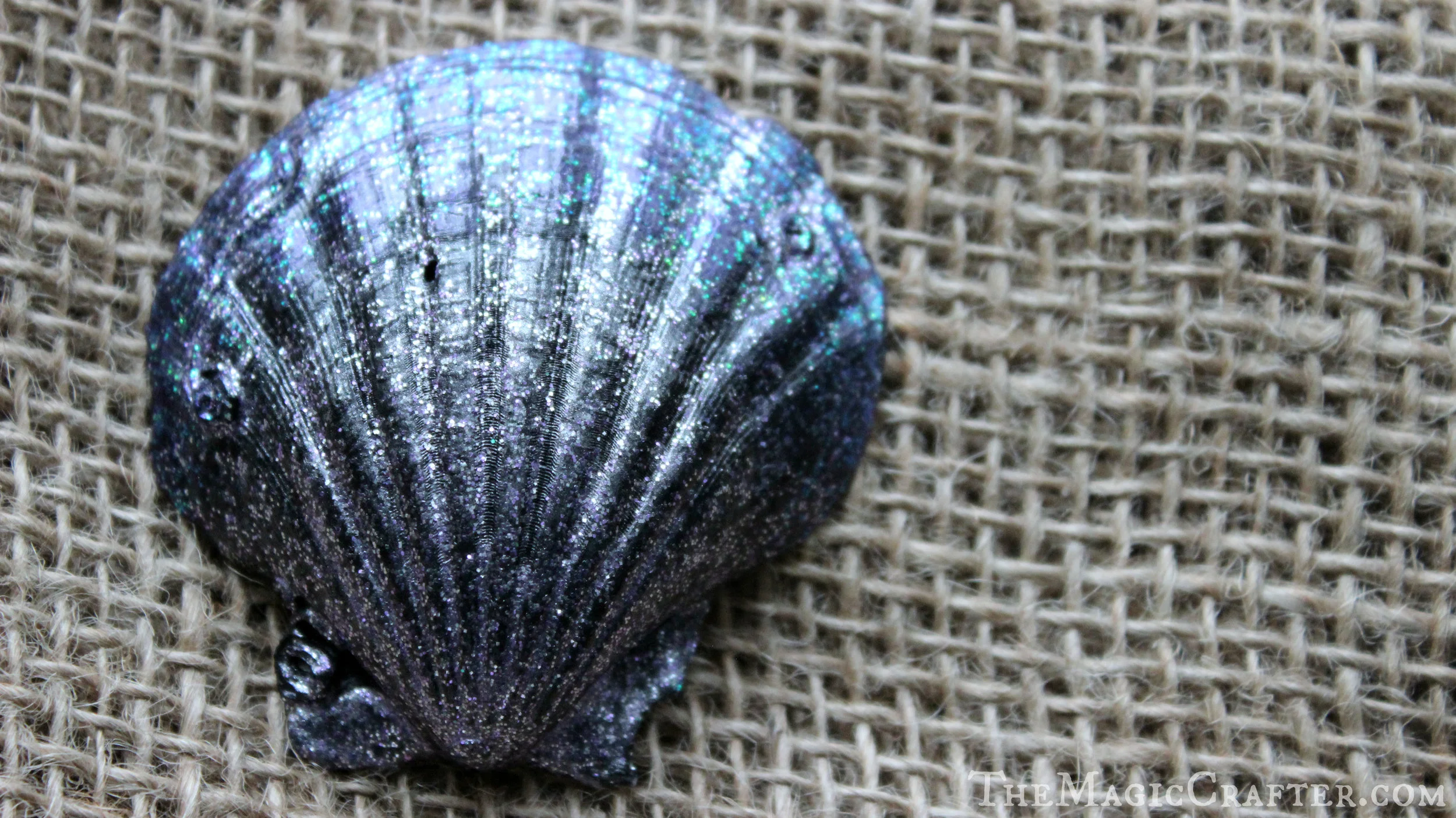 With a " Beetle Black " as a base, and a gradient of " Purple Sapphire " fading out into " Blueberry Slush, " this shell is a beautiful mix of Goth and Glitter! It takes a bit more effort to create than some of the other color combinations, but I think it's worth the time!