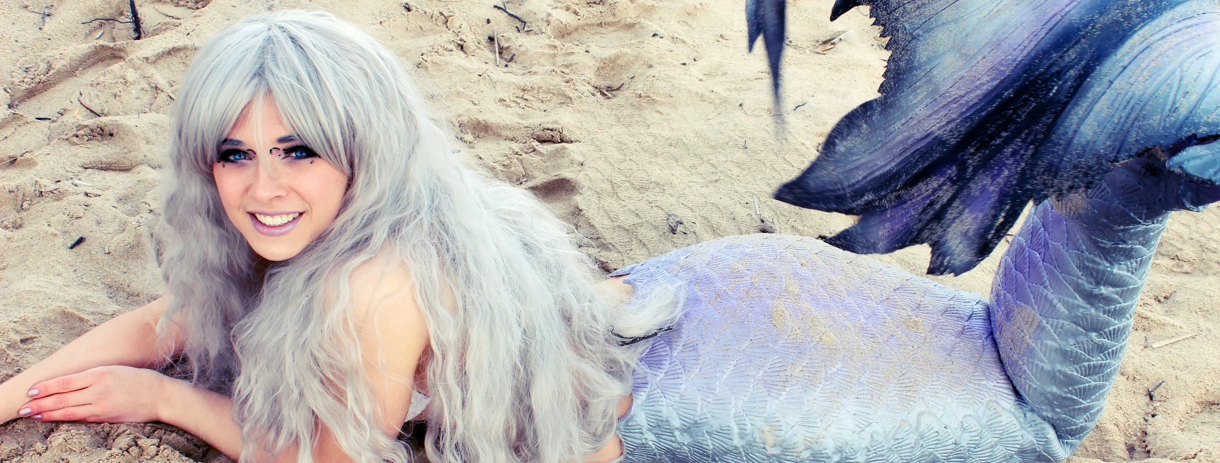 Blurry-Smiling-Mermaid-edit-LARGE-blue-banner.jpg