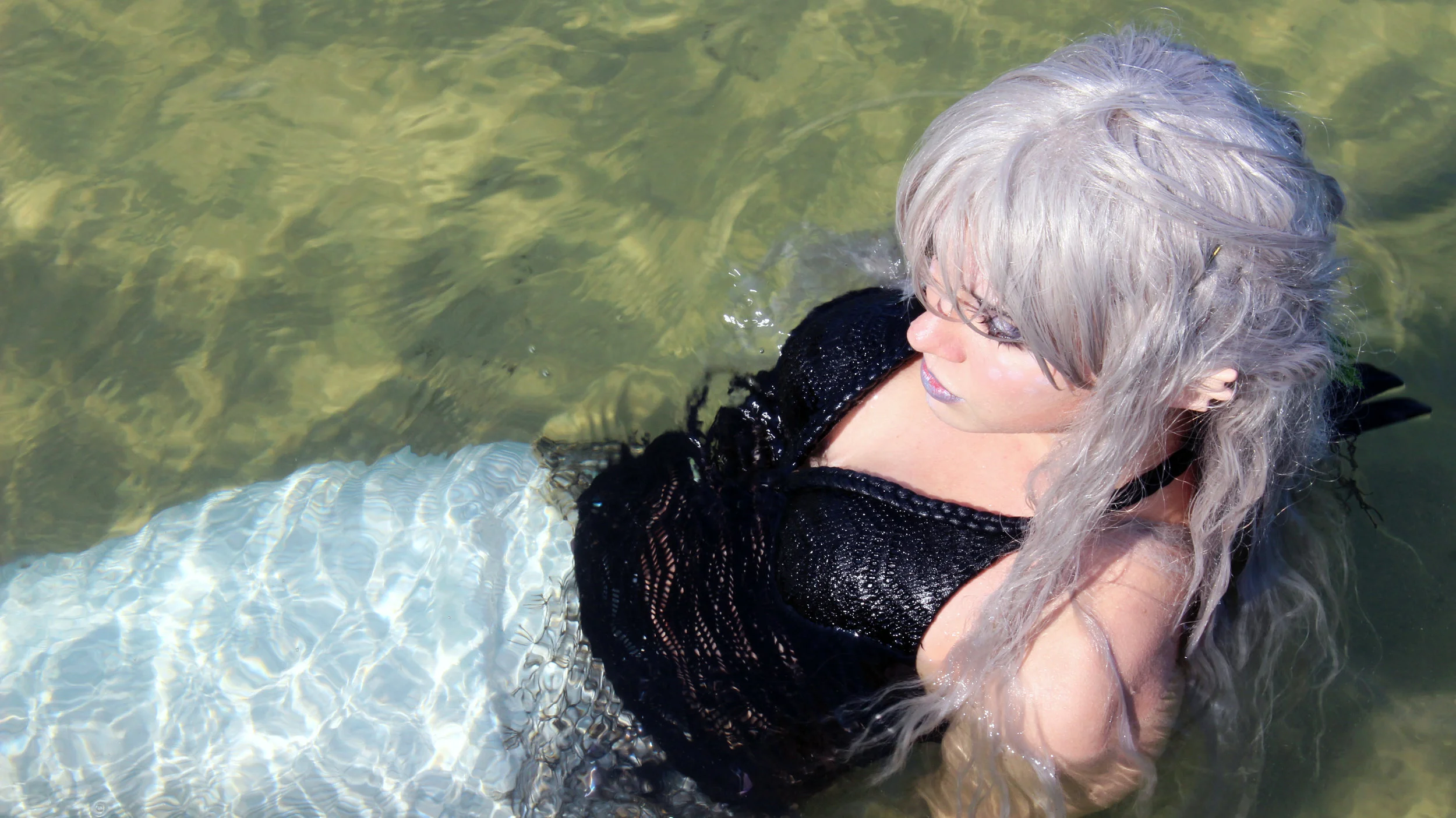 Mermaid Phantom, a professional mermaid, is seen here wearing her "Sea Elf" prosthetic ears from Aradani Costumes. 