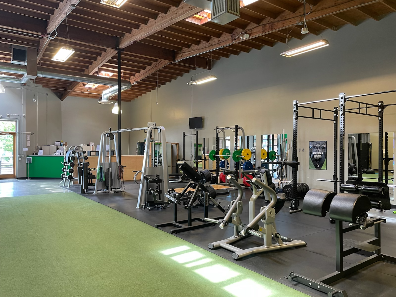 auto accident chiropractic and massage gym Seattle weight racks.png