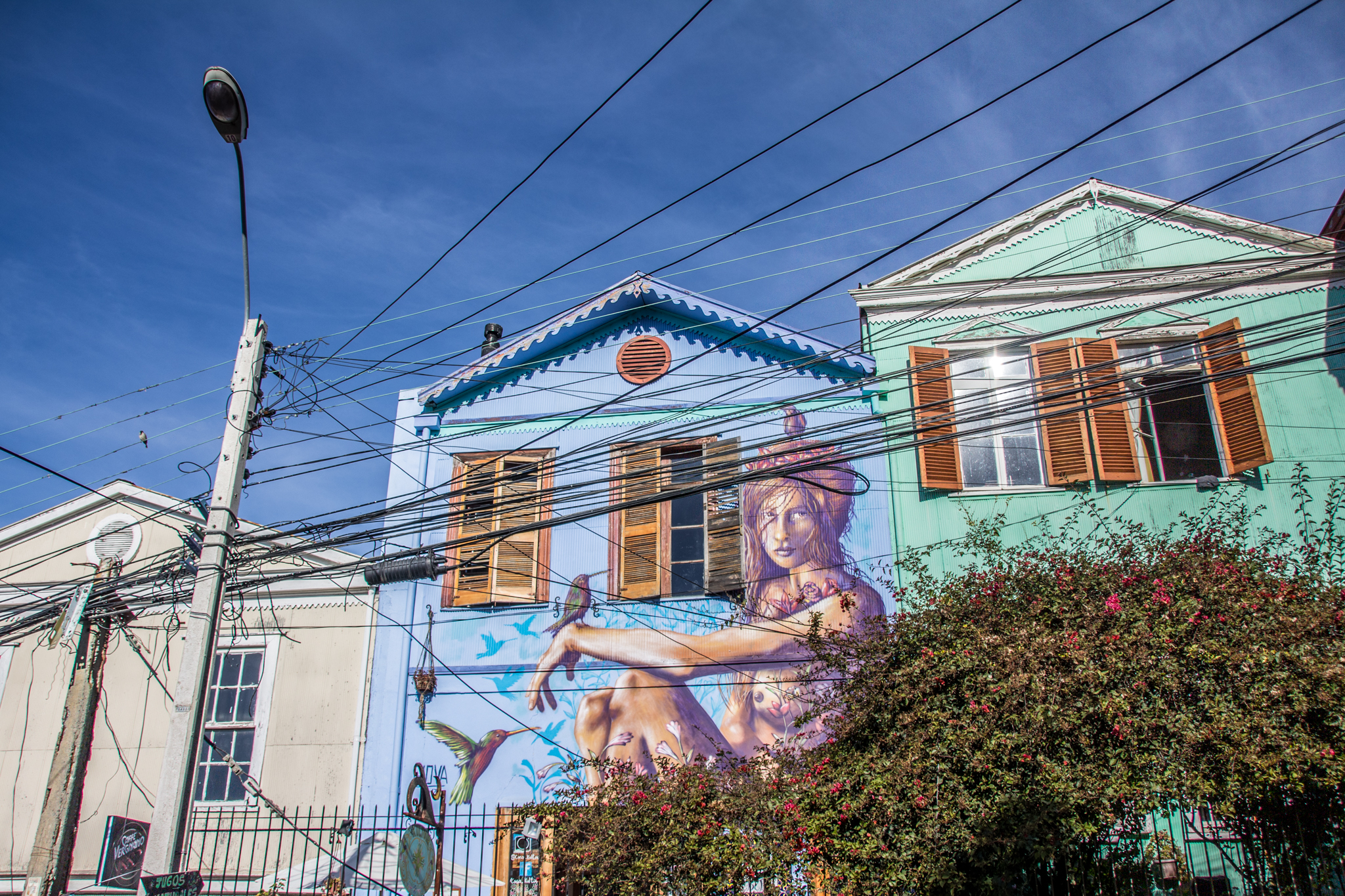 Valparaiso, Chile was the most fantastic place to find street art. They are so well known for it that they had souvenirs with various murals from the streets printed on them.