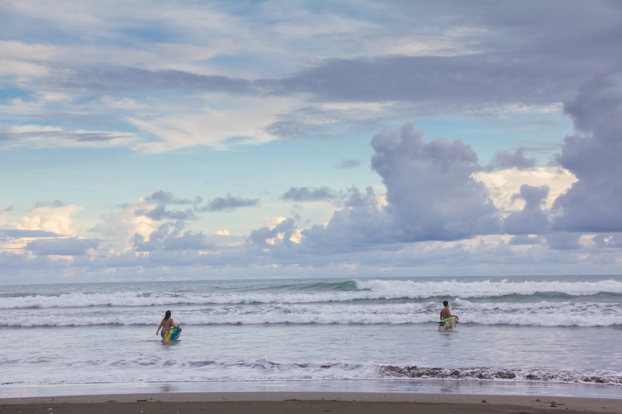 Our friends getting ready to body board!