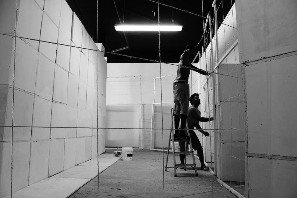 Vidal setting up his installation 
