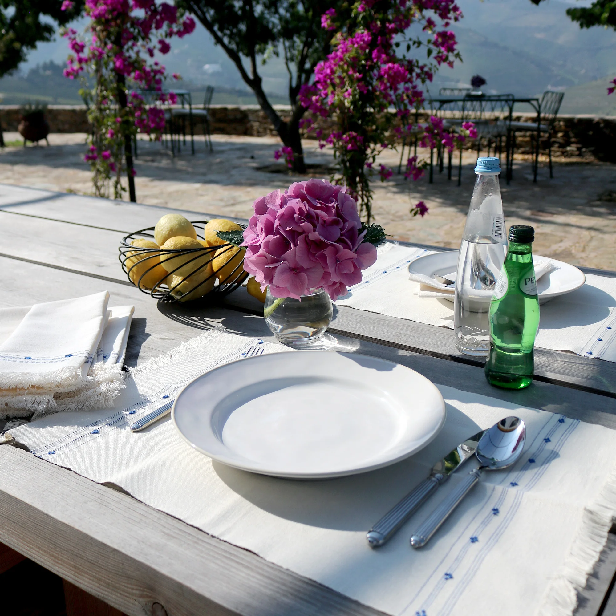 VilaReal_Handwoven_Linen_NaturalBlue_Setting2_2000x2000.jpg