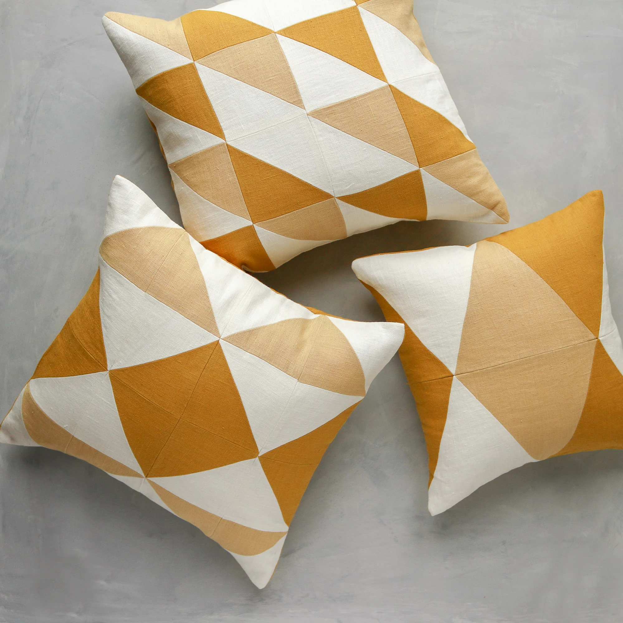 LusitanoStudio_LisboaPillows_Mustard_Group_Texture.jpg