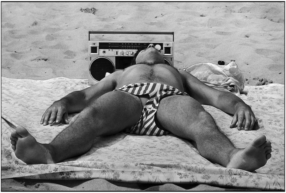 Man with portable radio. Brighton Beach. June 15, 1986