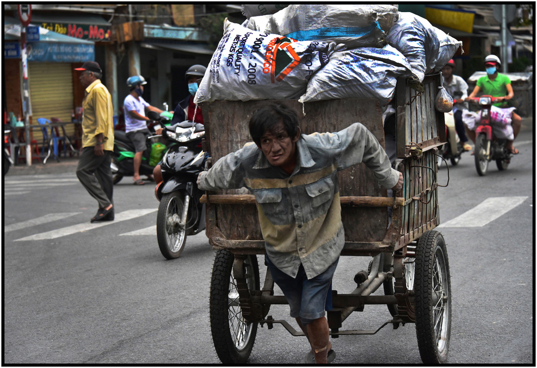  Impoverished worker and recyclables, Saigon/HCMC.&nbsp;Dec. 2015. #4294 