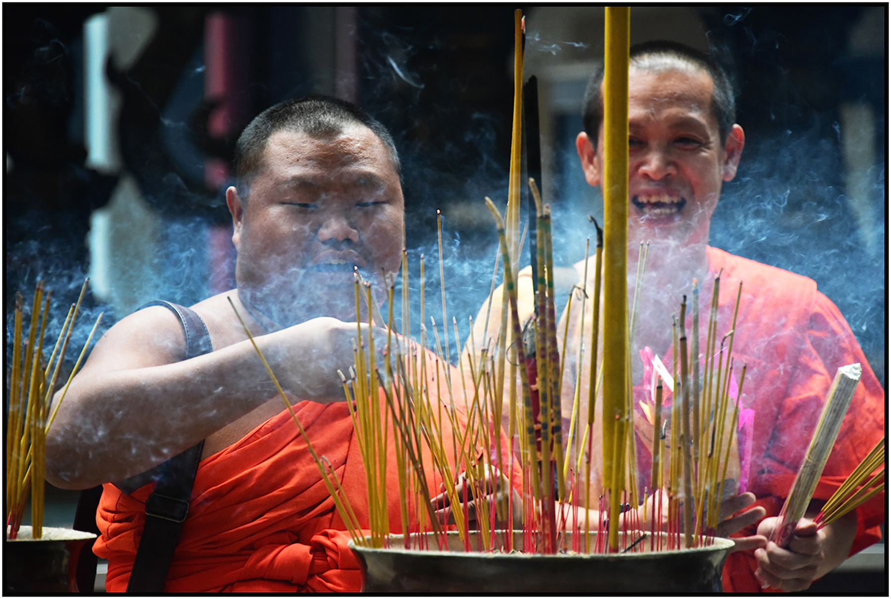  Monk burns his finger, his colleague laughs, ———Pagoda, Saigon/HCMC, Dec. 2016. #4342 