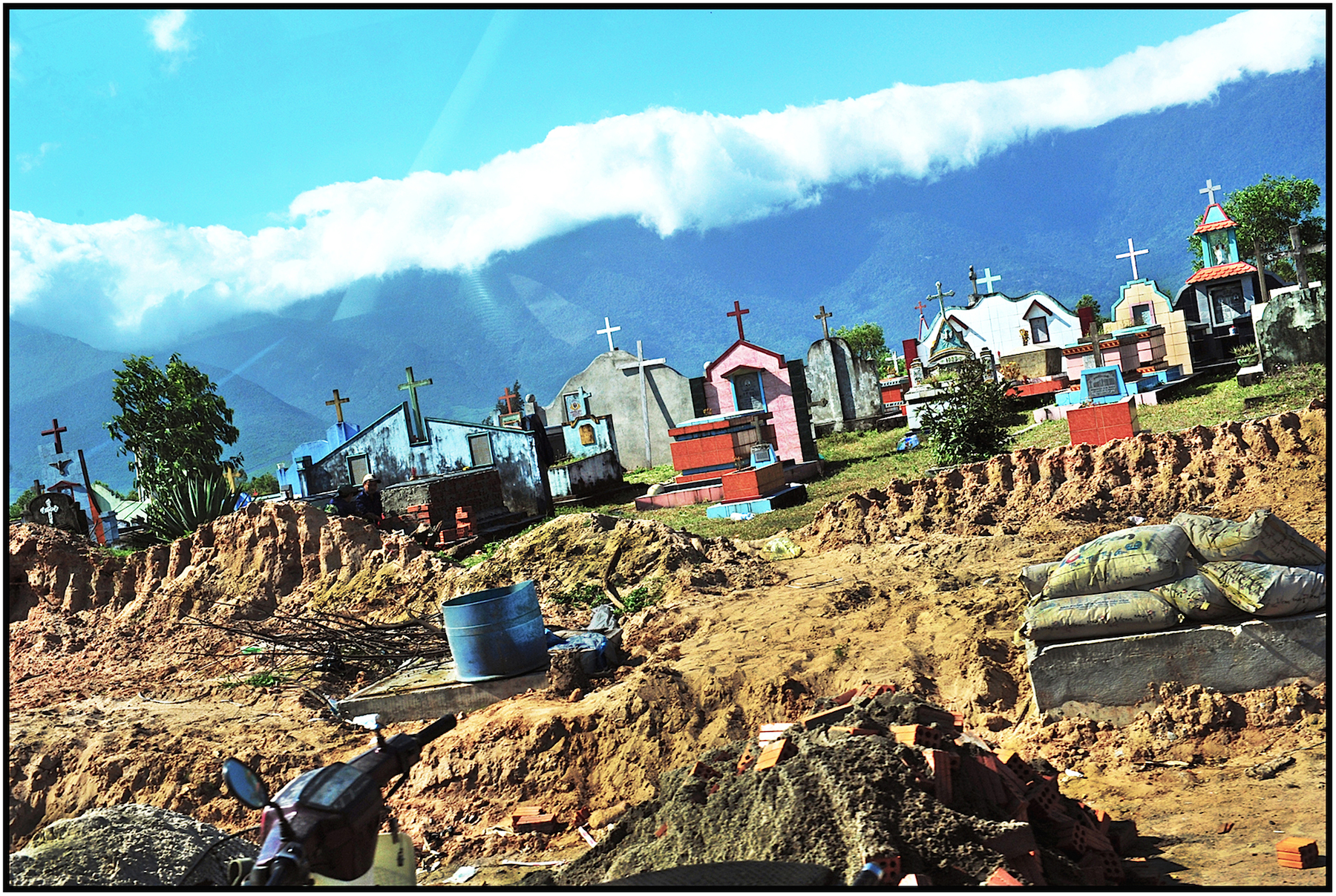  Road widening and cemetery, north of Danang, March 2015. #9251 