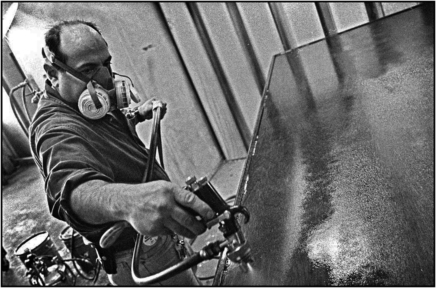   Worker repairs school furniture. 19--.  