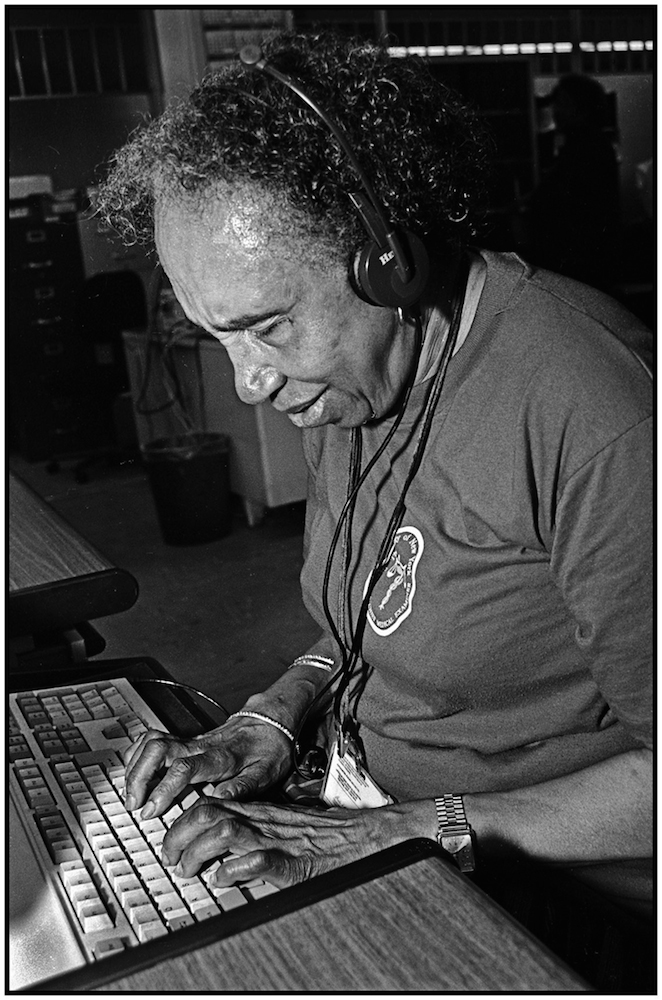 Marion Kiler uses Braile machine as supervising social worker in HRA. 1993.