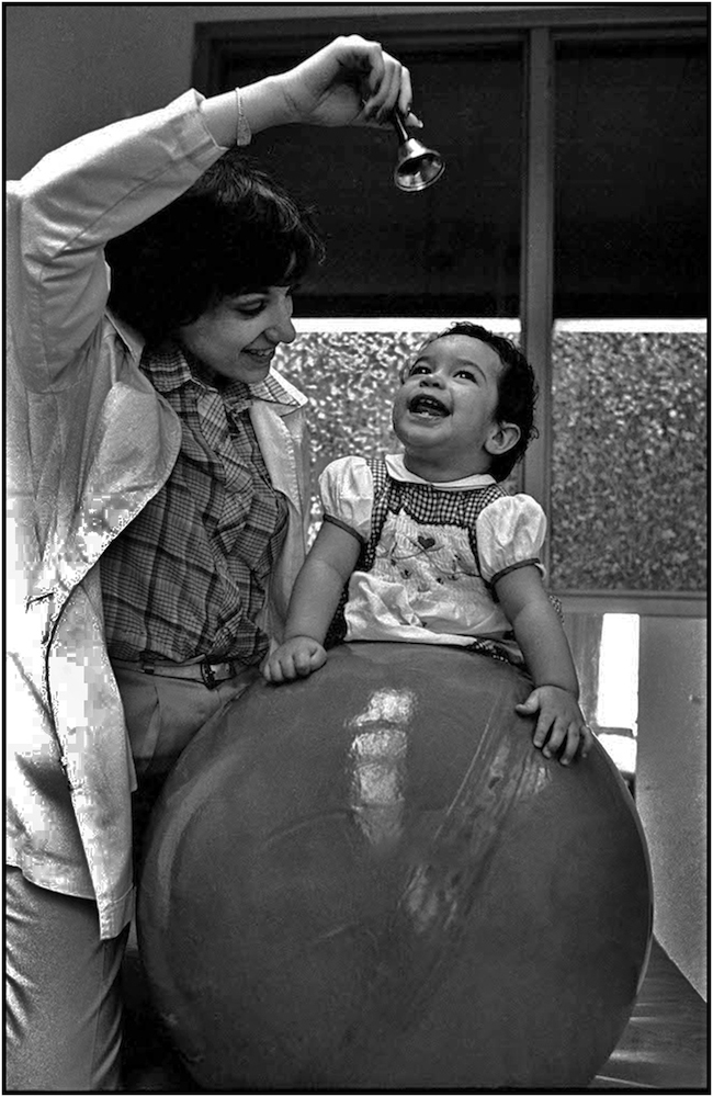   Occupational Therapist Anabel Gomez works with Ana Bodillo at Kings County Hospital. 1981.  