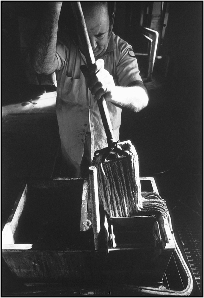   Housekeeping aide at Bellevue Hospital laundry. 1985.  