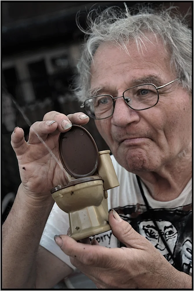 Vendor demonstrates his merchandise 