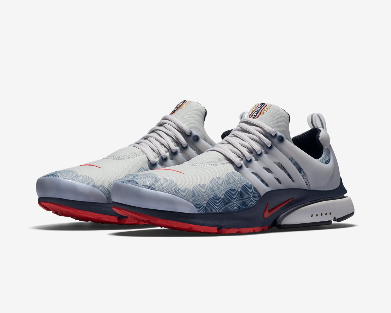This was a redesign / reissue of the 2000 Olympic Presto. The art for the design had been lost to time so I was tasked with recreating it as perfectly as possible knowing that it would be under serious scrutiny from sneaker heads. I utilized Nike's