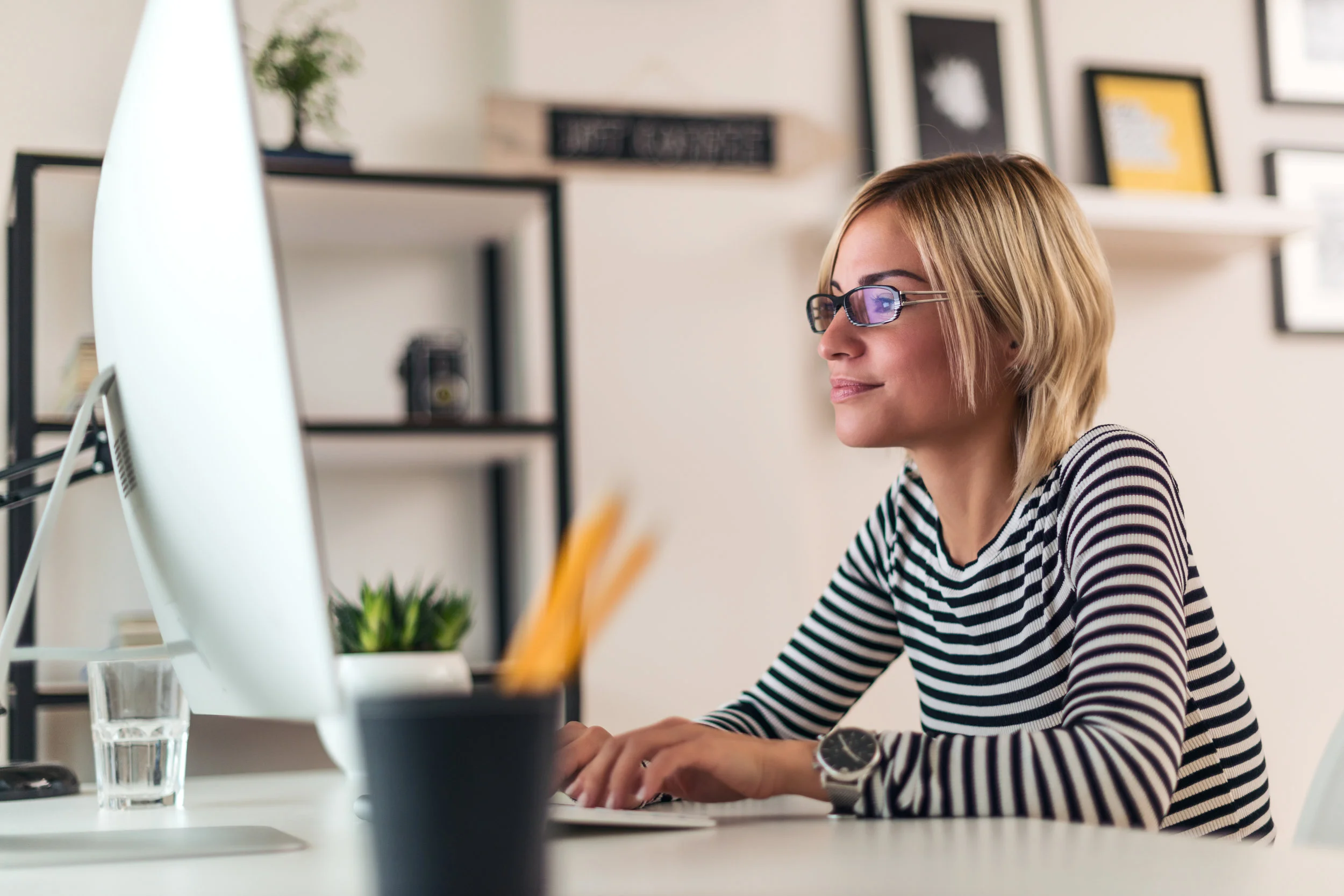 Woman stripes in front of computer.jpg
