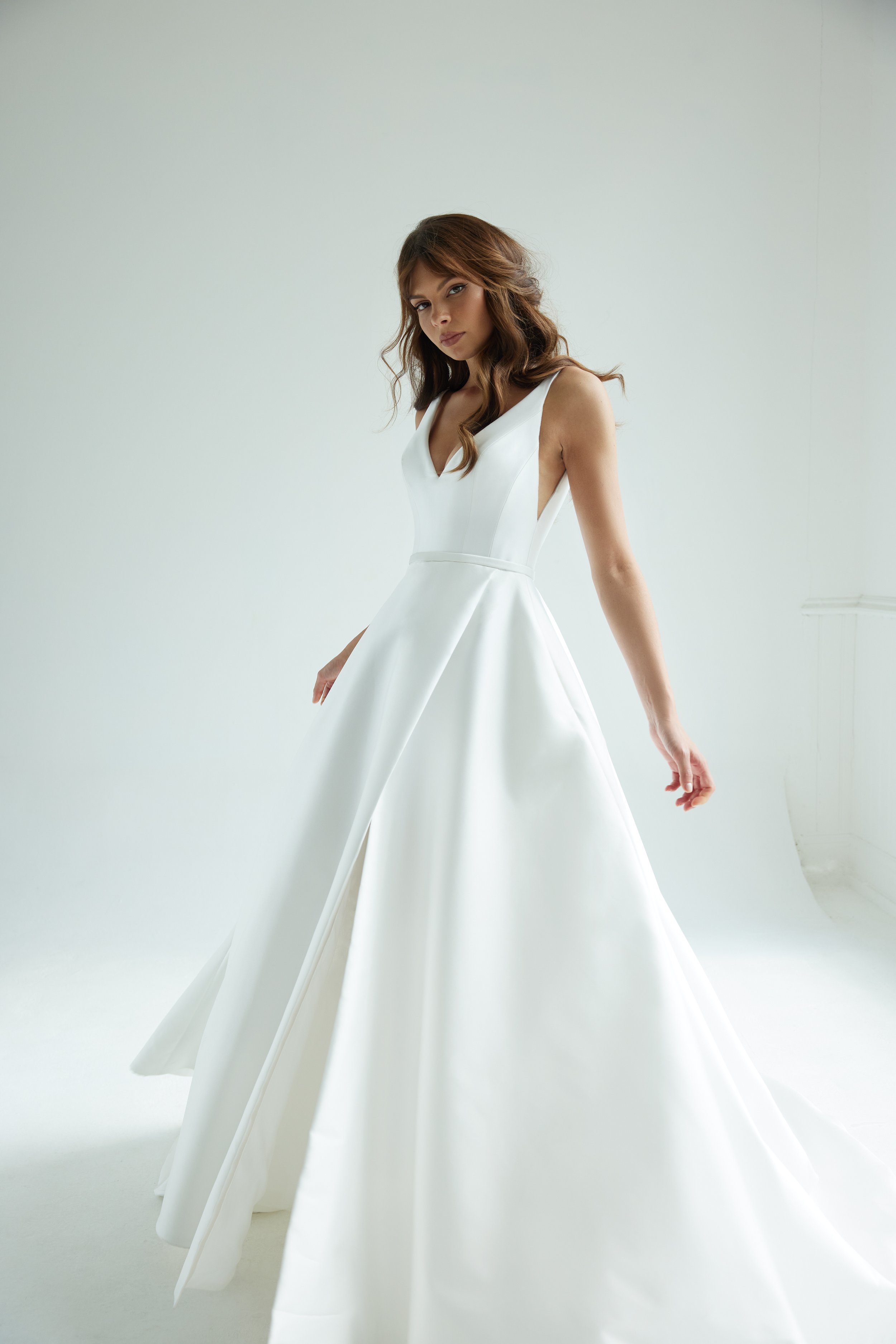 Conrad by Suzanne Neville at Frances Day Bridal 