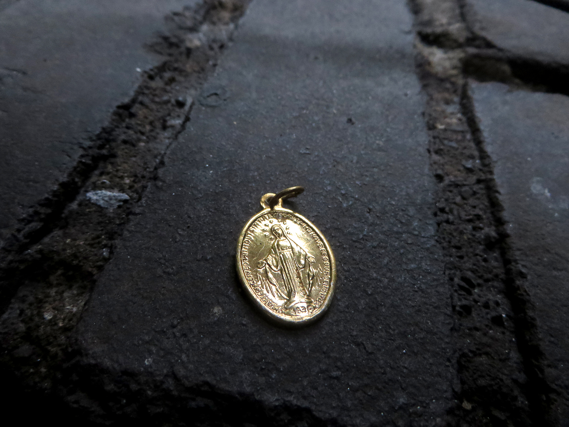 Mariano's photograph taken of a found charm outside the convent.