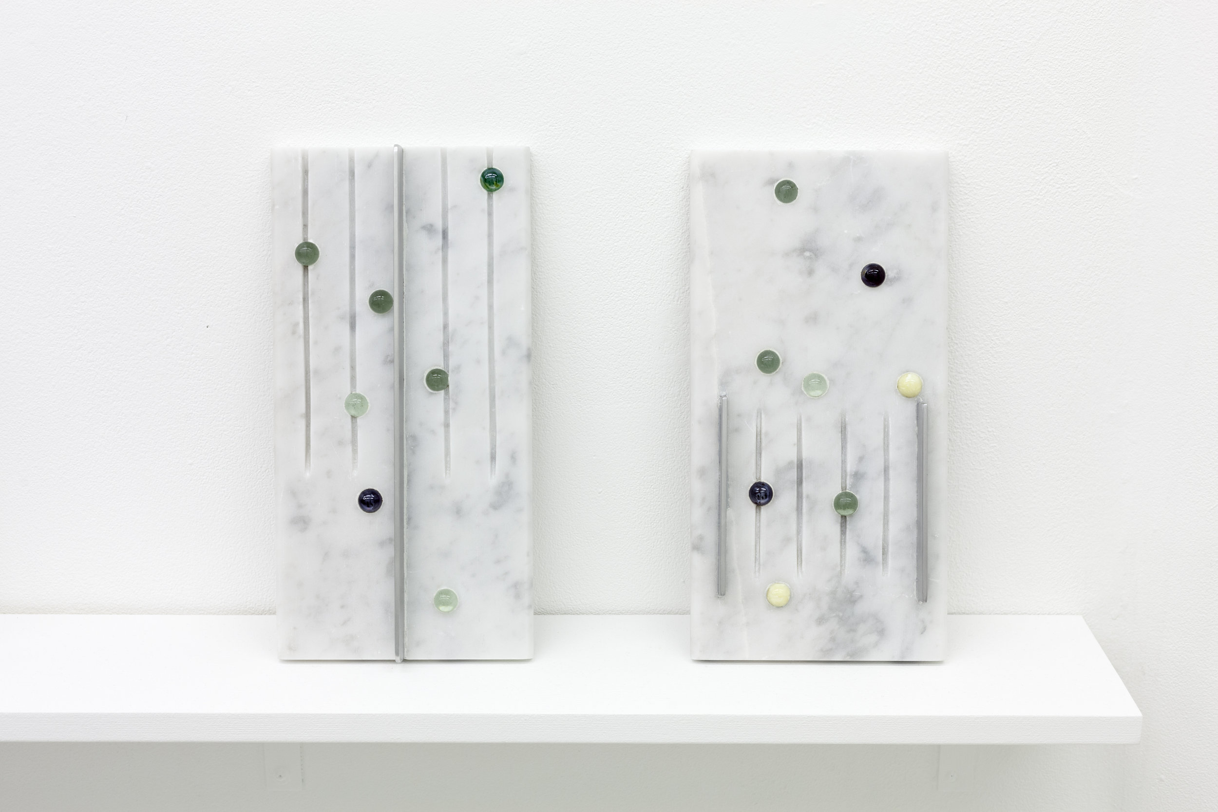 “Drain Tablet” (1, 2)  6” x 12” x .5” Grey Carrara marble, glass marbles, aluminum 2018