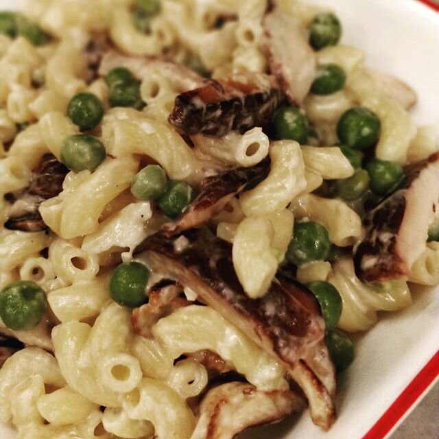 One-skillet dinner with co-op ingredients! Organic shiitakes, frozen organic peas, garlic, and Kirchenberg Goat Cheese mixed with noodles.